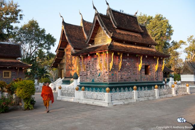 Monks Walking in Wat Xieng Thong Luang Prabang